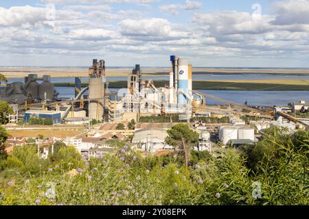 Modern cement factory, property of cimpor company, located in alhandra, portugal, operating near tagus river Stock Photo