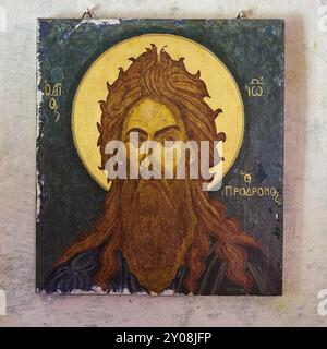 Orthodox icon of a saint with halo on ancient wall painting, Chapel of Agios Ioannis Prodromos, Sembronas, Lefka Ori, White Mountains, mountain massif Stock Photo