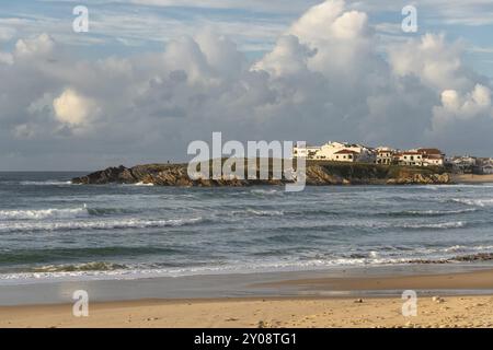 Baleal Island beach and beautiful houses with surfers on the atlantic ocean in Peniche, Portugal, Europe Stock Photo