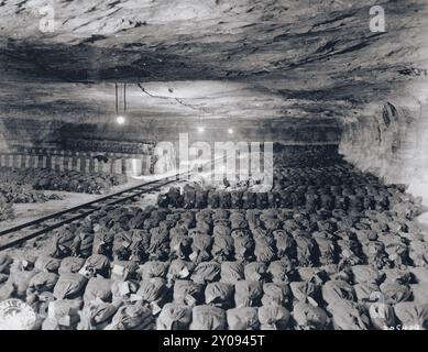 Bundles of currency, looted works of art, and other valuables from Berlin hidden in the Merkers salt mine. They were discovered by troops of teh US 3r Army. Stock Photo