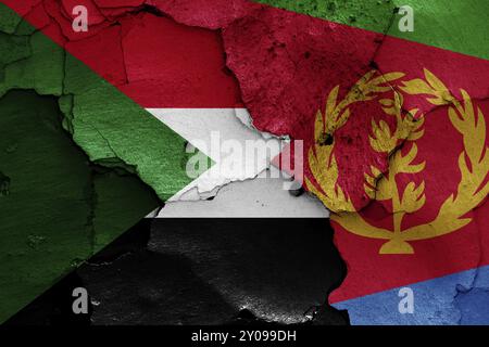 Flags of Sudan and Eritrea painted on cracked wall Stock Photo