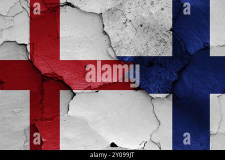 Flags of England and Finland painted on cracked wall Stock Photo