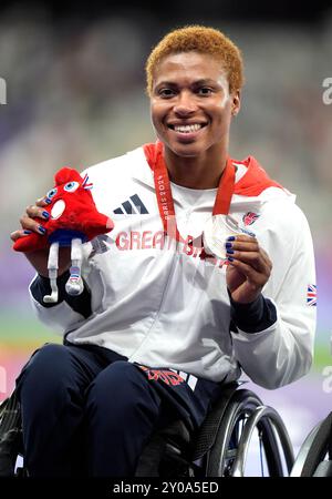 Great Britain's Kare Adenegan celebrates winning silver in the Women's 100m T34 Final at the Stade de France on day four of the Paris 2024 Summer Paralympic Games. Picture date: Sunday September 1, 2024. Stock Photo