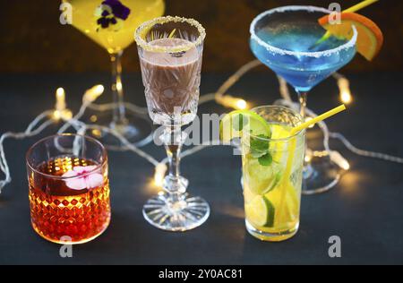 Different cold refreshing cocktails on the table. Selective focus Stock Photo