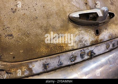 The rusty trunk lid of an unrestored vintage car tells of times gone by, germany, Essen, exhibition Techno-Classica Stock Photo