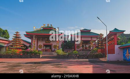 Balikpapan, Indonesia - June 22nd, 2024. Guang De Miao Temple or Kelenteng Setya Dharma showcasing its vibrant red and gold architecture, intricate ca Stock Photo