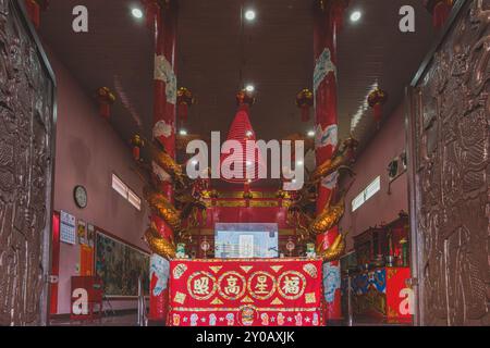 Balikpapan, Indonesia - June 22nd, 2024. the interior of a traditional Chinese temple in Balikpapan, Indonesia. The temple features a colorful altar a Stock Photo