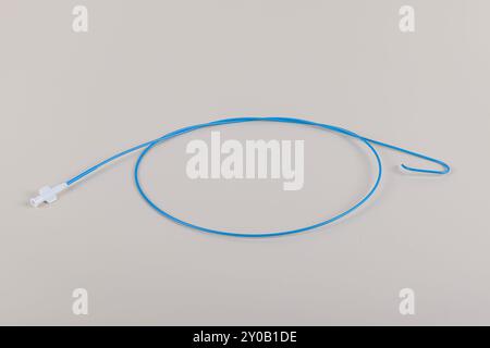 Angiographic Catheter (Cardiac Heart Catheter). Angioplasty guiding catheter(AL-2 catheter) used to treat blockages of the arteries of heart. Stock Photo