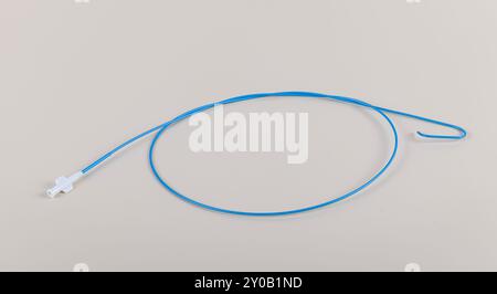 Angiographic Catheter (Cardiac Heart Catheter). Angioplasty guiding catheter(AL-2 catheter) used to treat blockages of the arteries of heart. Stock Photo