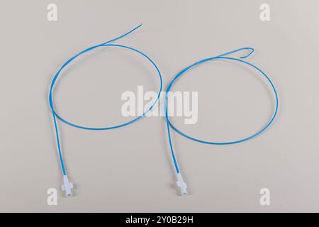 Angiographic Catheter (Cardiac Heart Catheter). Angioplasty guiding catheter(AL-2 catheter) used to treat blockages of the arteries of heart. Stock Photo