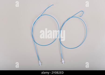 Angiographic Catheter (Cardiac Heart Catheter). Angioplasty guiding catheter(AL-2 catheter) used to treat blockages of the arteries of heart. Stock Photo