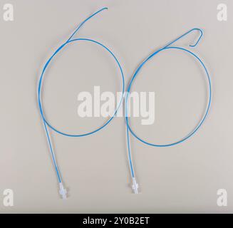 Angiographic Catheter (Cardiac Heart Catheter). Angioplasty guiding catheter(AL-2 catheter) used to treat blockages of the arteries of heart. Stock Photo