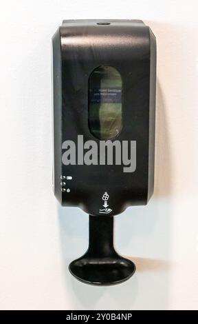 Automatic hand sanitizer station for public use Stock Photo