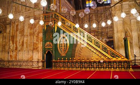 The richly decorated Minbar pulpit from where the prayers are led at the Muhammad Ali Mosque completed in Ottoman style by Muhammed Ali Pasha in 1848 at the citadel of Saladin in Islamic Cairo, Egypt Stock Photo