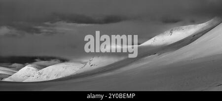 Mountain peak at dawn in the Stuor Reaiddavaggi valley, Kebnekaisefjaell, Norrbotten, Lapland, Sweden, March 2014, Europe Stock Photo