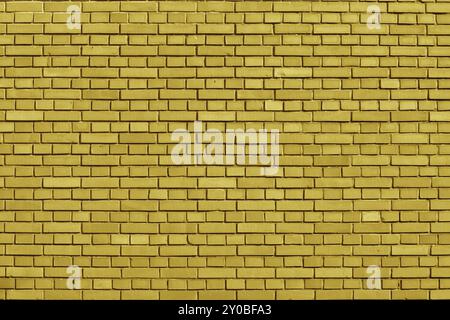 Ceylon Yellow colored brick wall background Stock Photo