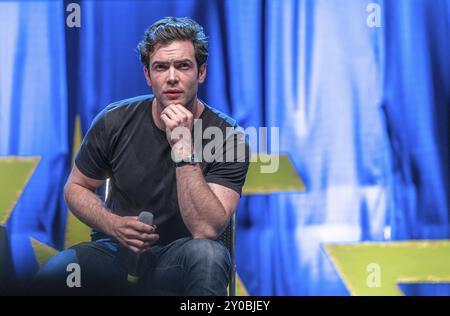 Bonn, Germany, June 8 2019: Ethan Peck (*1986, American actor, Star Trek: Discovery) talks about his experiences in Star Trek Discovery at FedCon 28, Stock Photo