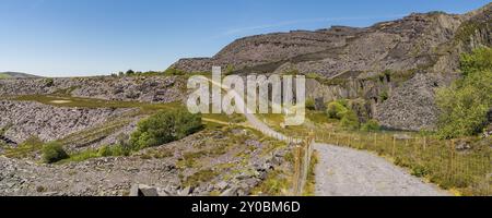 Walking in the derelict Dinorwic Quarry near Llanberis, Gwynedd, Wales, UK Stock Photo