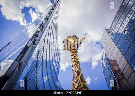 Giant giraffe built with Lego pieces, Potsdamer Platz buildings, Berlin, germany Stock Photo