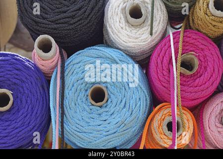 Various color ropes and yarns on coils Stock Photo