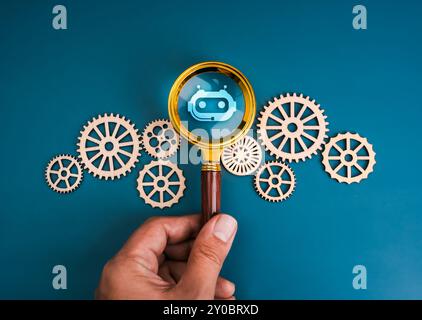 AI searching tools, development and management technology assistance service support concept. Bot icon in magnifying glass lens in human hand surround Stock Photo