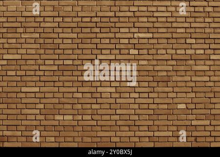 Meerkat colored brick wall background Stock Photo
