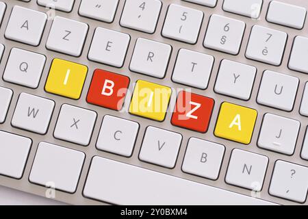 Ibiza in yellow and red on white keyboard Stock Photo