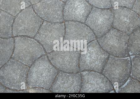 Unusual shaped concrete side walk tiles, gray abstract Stock Photo