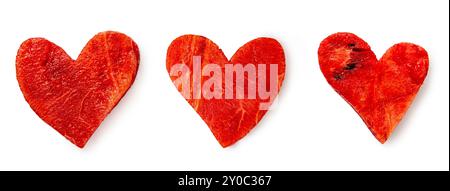 Three heart shaped red water melon slices banner, close up texture isolated on white Stock Photo