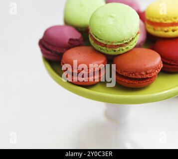 French homemade macaroons. Strawberry, pistachio, vanilla and raspberry macaroons Stock Photo