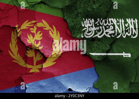 Flags of Eritrea and Saudi Arabia painted on cracked wall Stock Photo