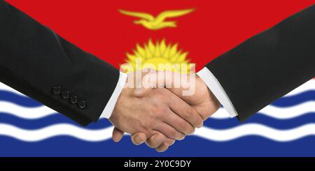 The Kiribati flag and business handshake Stock Photo