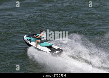 Amphibious water scooter, jetski riding on the Saint Lawrence River, Montreal, Province of Quebec, Canada, North America Stock Photo