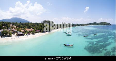 Aerial panoramic view of Pattaya Beach over crystal clear tropical water on island paradise Ko Lipe, Thailand, Asia Stock Photo