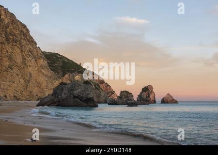 Ribeiro do Cavalo paradise beach in Arrabida Natural Park in Sesimbra at sunset, Portugal, Europe Stock Photo