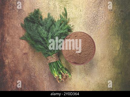 Dried dill, in a ceramic bowl, a bunch of fresh dill, seasoning, top view, no people Stock Photo