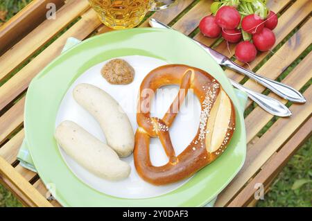 Bavarian veal sausage with pretzel, Veal sausage with Pretzel Stock Photo