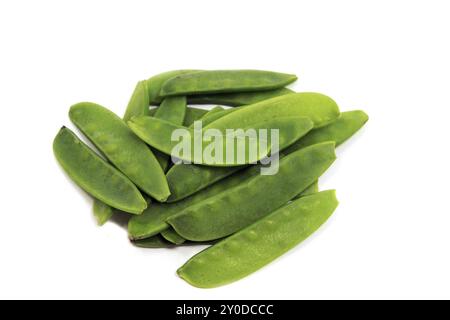 Many green pea pods on white background Stock Photo