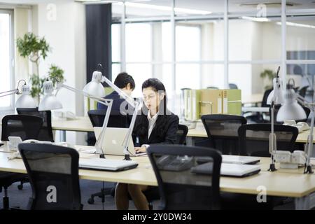 A businesswoman doing deskwork Stock Photo
