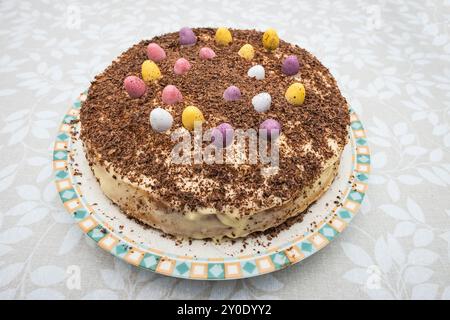 an Easter sponge cake with mini chocolate eggs for decoration Stock Photo