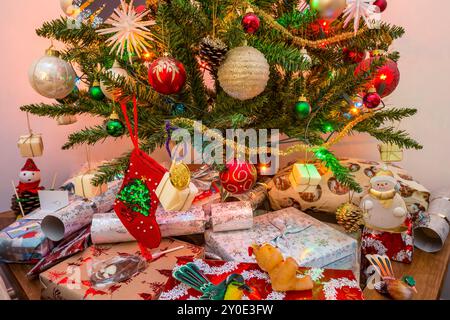 artificial indoors Christmas tree and decorations in a house, England,UK Stock Photo