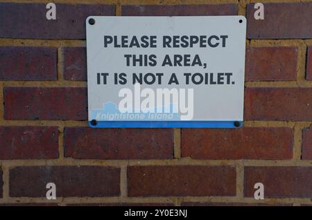 Sign on a building in England Stock Photo