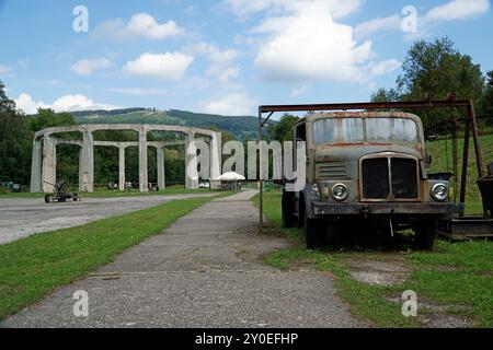 Ludwikowice Klodzkie, Poland - August 10th, 2024 - Old german truck and concrete structure at Molke Military Technology Museum Stock Photo