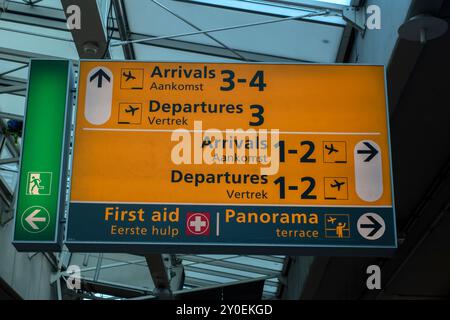 Direction Sign Before The Gates At Schiphol Airport The Netherlands 29-8-2024 Stock Photo