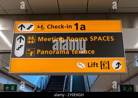 Direction Sign Before The Gates At Schiphol Airport The Netherlands 29-8-2024 Stock Photo