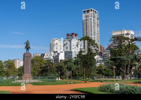 Statue of General Juan Manuel de Rosas in Mayor Seeber Square in the Palermo neighborhood of Buenos Aires, Argentina.  High-rise apartment buildings a Stock Photo