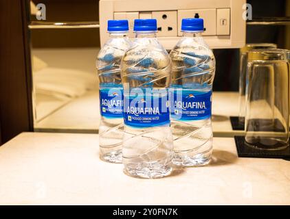 Three bottles of Aquafina packaged drinking water. Stock Photo