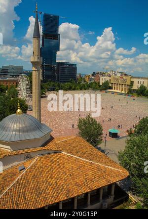 Skanderbeg Square in Tirana, Albania viewed from top of Clock Tower over the roof of Ethem Bey Mosque. National History museum right Stock Photo