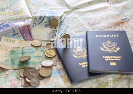 American Passports on Street Map with Foreign Currency Stock Photo