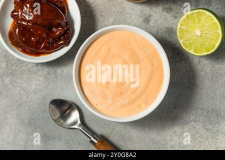 Homemade Spicy Chipotle Mayo Spread in a Bowl Stock Photo